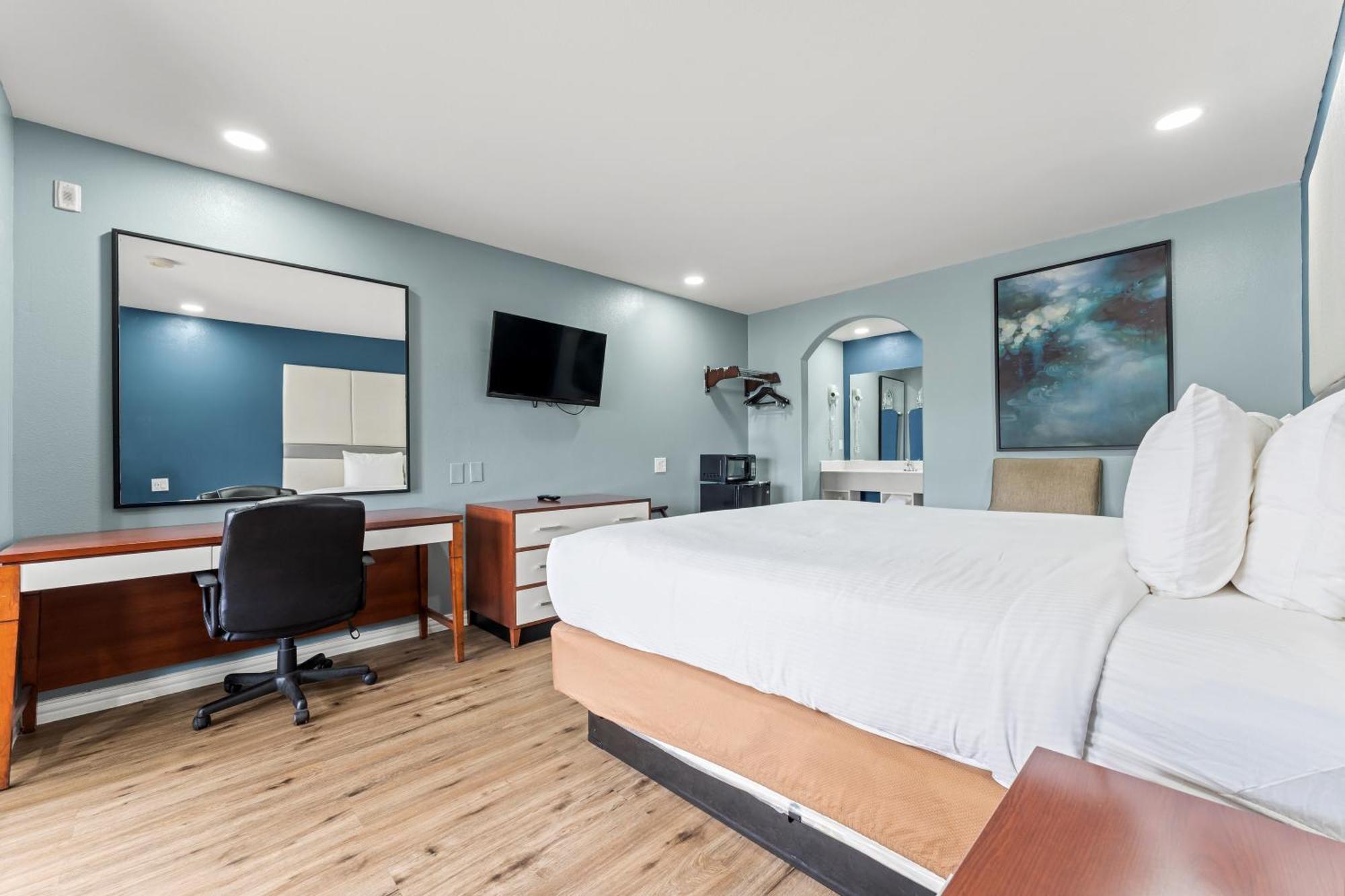 Executive Inn & Suites Магнолія Екстер'єр фото